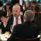 Acting U.S. Attorney General Matthew Whitaker, left, dines with other officials, Tuesday, Nov. 20, 2018, in New York. Before joining the Justice Department, Whitaker earned nearly $1 million from a right-leaning nonprofit that doesn&#39;t disclose its donors, according to financial disclosure forms released Tuesday. (AP Photo/Craig Ruttle)