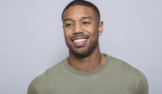 FILE - In this Jan. 30, 2018 file photo, Michael B. Jordan poses for a portrait at a press junket at the Montage Beverly Hills in Beverly Hills, Calif.  Jordan&#x27;s latest film, &amp;quot;Creed II,&amp;quot; hits theaters on Wednesday, Nov. 21. (Photo by Willy Sanjuan/Invision/AP, File)