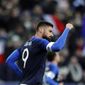 France&#x27;s Olivier Giroud celebrates scoring the opening goal on a penalty kick during an international friendly soccer match between France and Uruguay at the Stade de France stadium in Saint-Denis, outside Paris, Tuesday, Nov. 20, 2018. (AP Photo/Francois Mori)