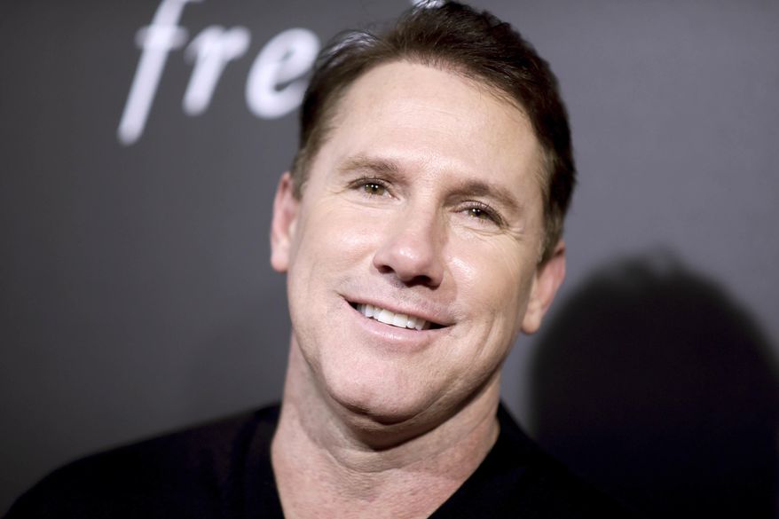 In this Feb. 1, 2016 file photo, Nicholas Sparks attends a special screening of "The Choice" in Los Angeles. A federal judge says the headmaster forced out of running a private Christian school founded by Sparks after less than five months can continue to sue the author, the North Carolina school, and the foundation Sparks created to support it. (Photo by Richard Shotwell/Invision/AP, File) **FILE**