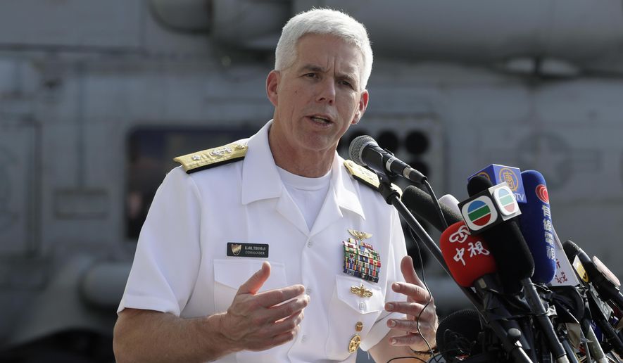 In this file photo, then-U.S. Rear Admiral Karl Thomas speaks on the deck of the U.S. Navy USS Ronald Reagan aircraft carrier in Hong Kong, Wednesday, Nov. 21, 2018. Now a vice admiral who serves as commander of the U.S. Seventh Fleet, he recently told the Wall Street Journal that China has the capability to blockade Taiwan. (AP Photo/Kin Cheung)  **FILE**