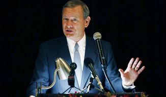 FILE - In this Sept. 27, 2017 file photo, Chief Justice John Roberts speaks during the Bicentennial of Mississippi&#39;s Judiciary and Legal Profession Banquet in Jackson, Miss. Roberts is pushing back against President Donald Trump’s description of a judge who ruled against the administration’s new asylum policy as an “Obama judge.” It’s the first time that the leader of the federal judiciary has offered even a hint of criticism of Trump, who has previously blasted federal judges who ruled against him.  Roberts says Wednesday that the U.S. doesn’t have ”Obama judges or Trump judges, Bush judges or Clinton judges.” He is commenting in a statement released by the Supreme Court after a query by The Associated Press. (AP Photo/Rogelio V. Solis)