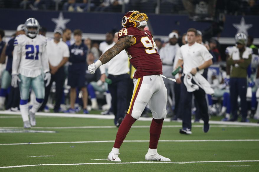 Washington Redskins outside linebacker Preston Smith (94) celebrates a sack against the Dallas Cowboys during the first half of an NFL football game in Arlington, Texas, Thursday, Nov. 22, 2018. (AP Photo/Michael Ainsworth) ** FILE **