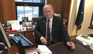 In this Nov. 13, 2018 photo, Alaska Gov. Bill Walker poses in his office at the state Capitol in Juneau, Alaska. Walker, an independent, leaves office Dec. 3, 2018, and will be succeeded by Republican Gov.-elect Mike Dunleavy. (AP Photo/Becky Bohrer)