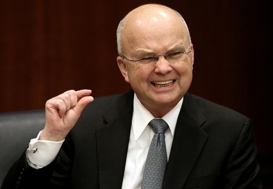 In this Jan. 15, 2009, file photo, then-CIA Director Michael Hayden gestures during a news conference at CIA headquarters in Langley, Va. Mr. Hayden has endorsed Joe Biden for president, praising his character over against President Trump, whom he says is not a good man. f(AP Photo/Luis M. Alvarez, File)