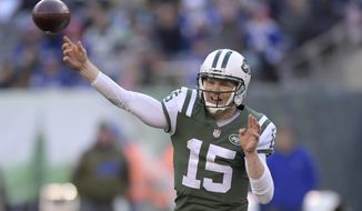FILE - In this Nov. 11, 2018 file photo, New York Jets quarterback Josh McCown (15) passes during the second half of an NFL football game against the Buffalo Bills in East Rutherford, N.J. McCown will get his second straight start when the Jets take on the New England Patriots on Sunday, Nov. 25. (AP Photo/Bill Kostroun, File)