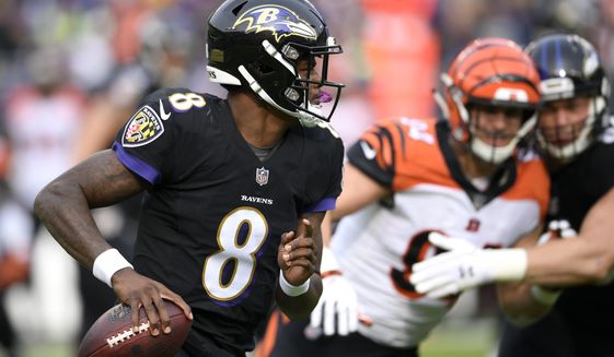 FILE- In this Nov. 18, 2018, file photo Baltimore Ravens quarterback Lamar Jackson (8) looks for a receiver in the first half of an NFL football game against the Cincinnati Bengals in Baltimore. Understanding that 27 carries a game is way too dangerous for an NFL quarterback, Jackson may do things differently in his second NFL start Sunday, Nov. 25. (AP Photo/Nick Wass, File)