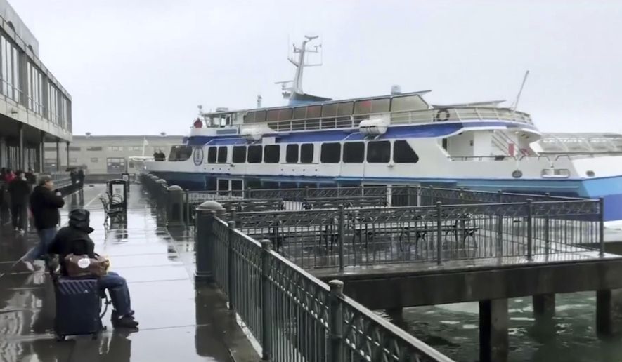 In this image taken from video a ferry carrying dozens of passengers crashes into a dock at San Francisco's famed Ferry Building on Friday, Nov. 23, 2018. (Tiffany Dennis via AP)