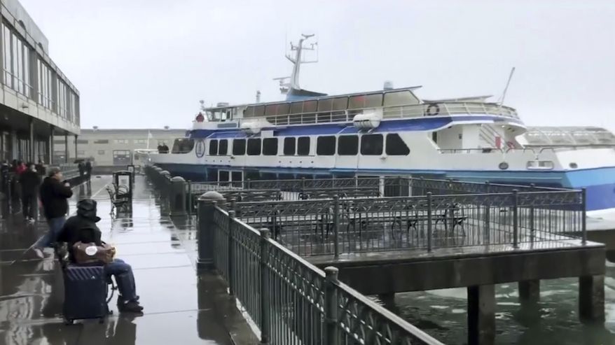 In this image taken from video a ferry carrying dozens of passengers crashes into a dock at San Francisco's famed Ferry Building on Friday, Nov. 23, 2018. (Tiffany Dennis via AP)