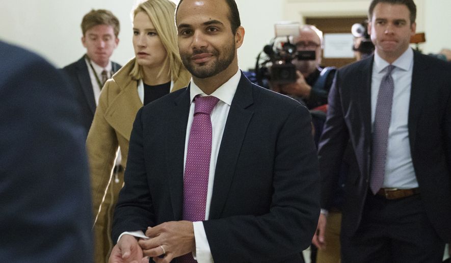 In this Oct. 25, 2018, photo, George Papadopoulos, the former Trump campaign adviser who triggered the Russia investigation, arrives for his first appearance before congressional investigators, on Capitol Hill in Washington. A judge has rejected an effort by former Trump campaign foreign policy adviser Papadopoulos to delay his two-week prison term and says Papadopoulos must surrender Monday, Nov. 26, as scheduled. (AP Photo/Carolyn Kaster) **FILE**