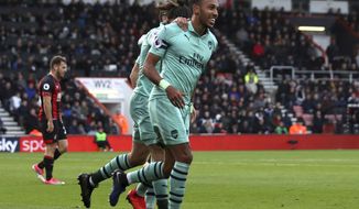 Arsenal&#39;s Pierre-Emerick Aubameyang celebrates scoring his side&#39;s second goal of the game against Bournemouth during their English Premier League soccer match at The Vitality Stadium in Bournemouth, England, Sunday Nov. 25, 2018. (John Walton/PA via AP)