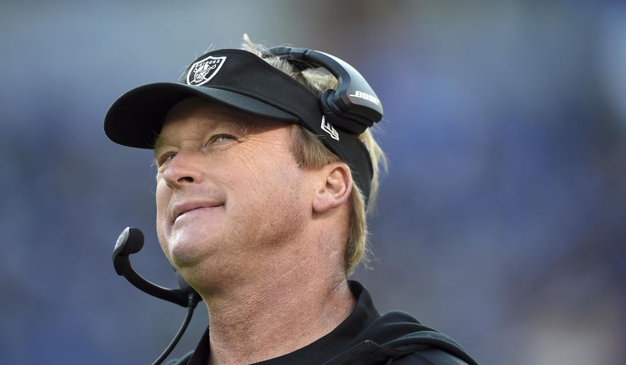 Oakland Raiders head coach Jon Gruden stands on the sideline in the second half of an NFL football game against the Baltimore Ravens, Sunday, Nov. 25, 2018, in Baltimore. (AP Photo/Gail Burton) ** FILE **