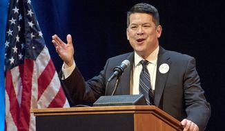 In this Jan. 5, 2018 photo, T.J. Cox, a candidate for the 21st U.S. Congressional District, speaks at a Democratic Party debate at the Gallo Center for the Arts in Modesto. Cox has edged ahead of Republican David Valadao in a U.S. House race in California&#39;s farm belt, where votes continue to be counted. Cox has trailed since election night but pulled ahead by 438 votes Monday, Nov. 26, 2018, according to tallies in the 21st District that cuts through four Central Valley counties. The Associated Press had declared Valadao the winner, but votes that have been counted since Nov. 6 narrowed the race and the AP retracted its race call on Monday. (Andy Alfaro/Modesto Bee via AP)