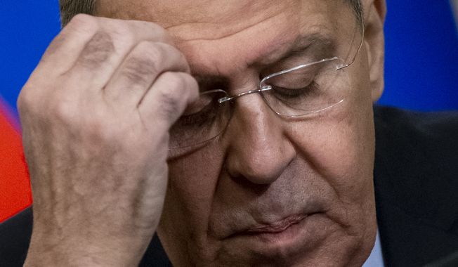Russian Foreign Minister Sergey Lavrov attends a joint news conference with his Dominican Republic counterpart Miguel Vargas following their talks in Moscow, Russia, Monday, Nov. 26, 2018. Regarding the incident where a Russian coast guard fired on three Ukrainian boats Sunday and then seized them along with the crews Lavrov said Monday that Ukraine has violated international law and provoked Russia by sending its navy vessels through the Kerch Strait without permission. (AP Photo/Alexander Zemlianichenko)