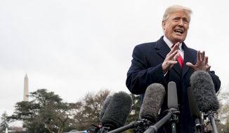 President Donald Trump speaks to members of the media before boarding Marine One on the South Lawn of the White House in Washington, Monday, Nov. 26, 2018, for a short trip to Andrews Air Force Base, Md., and then on to Mississippi for rallies. (AP Photo/Andrew Harnik)