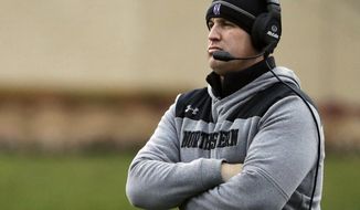FILE - In this Nov. 24, 2018, file photo, Northwestern head coach Pat Fitzgerald watches his team during the first half of an NCAA college football game against Illinois in Evanston, Ill. No. 21 Northwestern set to face No. 6 Ohio State in the Wildcats’ first Big Ten championship game appearance on Saturday, Dec. 1, 2018, in what could be a signature moment for a consistent winner trying to earn its spot among the conference’s elite. (AP Photo/Nam Y. Huh, File)