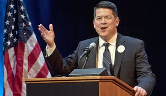In this Jan. 5, 2018 photo, T.J. Cox, a candidate for the 21st U.S. Congressional District, speaks at a Democratic Party debate at the Gallo Center for the Arts in Modesto. Cox has edged ahead of Republican David Valadao in a U.S. House race in California&#39;s farm belt, where votes continue to be counted. Cox has trailed since election night but pulled ahead by 438 votes Monday, Nov. 26, 2018, according to tallies in the 21st District that cuts through four Central Valley counties. The Associated Press had declared Valadao the winner, but votes that have been counted since Nov. 6 narrowed the race and the AP retracted its race call on Monday. (Andy Alfaro/Modesto Bee via AP)