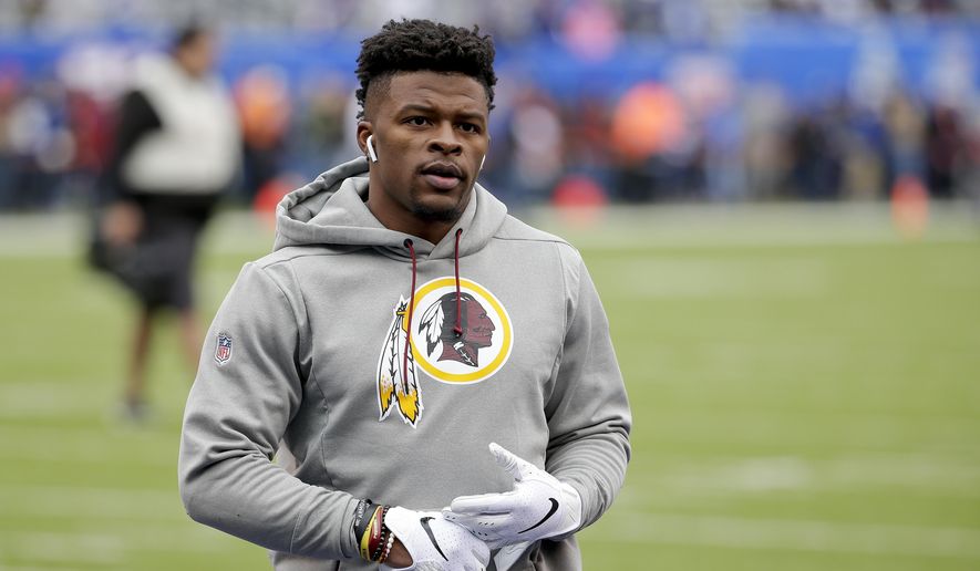 FILE - In this Oct. 28, 2018, file photo, Washington Redskins running back Chris Thompson (25) warms up before an NFL football game against the New York Giants in East Rutherford, N.J. The Redskins hope they can get Thompson back after breaking two ribs. (AP Photo/Seth Wenig, File) **FILE**