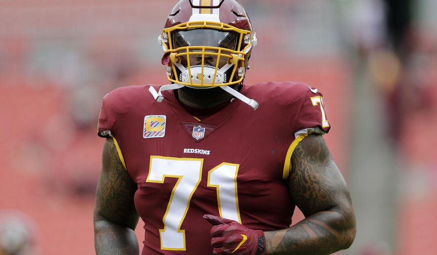 In this Oct. 17, 2017, file photo, Washington Redskins offensive tackle Trent Williams warms up prior to an NFL football game against the San Fransisco 49ers in Landover, Md. Thompson hopes he can play after missing the past six games with a fracture on each side of his rib cage. (AP Photo/Mark Tenally) ** FILE **