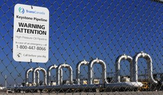 In this Nov. 3, 2015 file photo, the Keystone Steele City pumping station, into which the planned Keystone XL pipeline is to connect to, is seen in Steele City, Neb.  (AP Photo/Nati Harnik, File) **FILE**