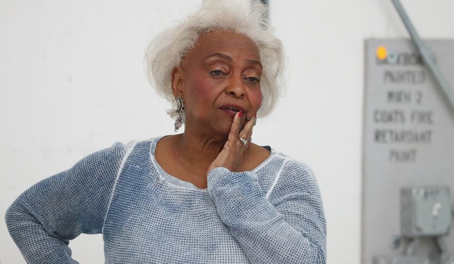 Broward County Supervisor of Elections Brenda Snipes watches workers do a hand recount at the Broward County Supervisor of Elections office, Friday, Nov. 16, 2018, in Lauderhill, Fla. Florida&#39;s acrimonious U.S. Senate contest is headed to a legally required hand recount after an initial review by ballot-counting machines showed Republican Gov. Rick Scott and Democratic Sen. Bill Nelson separated by fewer than 13,000 votes.  (AP Photo/Wilfredo Lee)