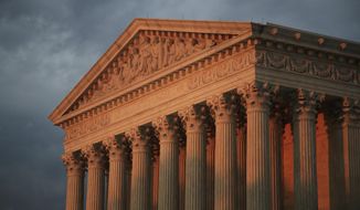 In this Oct. 4, 2018 photo, the U.S. Supreme Court is seen at sunset in Washington. (AP Photo/Manuel Balce Ceneta)