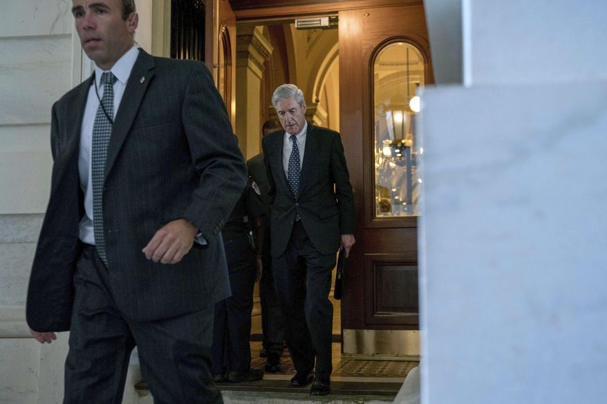 In this June 21, 2017, photo, former FBI Director Robert Mueller, the special counsel probing Russian interference in the 2016 election, departs Capitol Hill following a closed door meeting in Washington. (AP Photo/Andrew Harnik) **FILE**