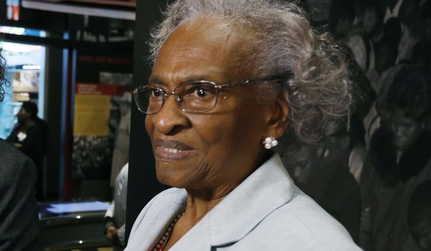 FILE - In this Nov. 10, 2017 file photo, Ellie Dahmer views the exhibits at the Mississippi Civil Rights Museum during a private preview in Jackson, Miss. The widow of a slain civil rights activist, Vernon Dahmer, says she forgives the person who draped a Confederate battle flag over her husband’s gravesite. Dahmer tells The Associated Press on Wednesday, Nov. 28, 2018, that her family was told that the black woman who left the flag Tuesday did it to protest “how much hate was in that Confederate flag.” (AP Photo/Rogelio V. Solis, File)