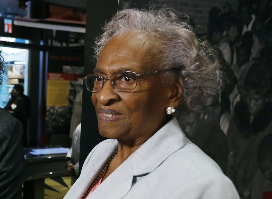 FILE - In this Nov. 10, 2017 file photo, Ellie Dahmer views the exhibits at the Mississippi Civil Rights Museum during a private preview in Jackson, Miss. The widow of a slain civil rights activist, Vernon Dahmer, says she forgives the person who draped a Confederate battle flag over her husband’s gravesite. Dahmer tells The Associated Press on Wednesday, Nov. 28, 2018, that her family was told that the black woman who left the flag Tuesday did it to protest “how much hate was in that Confederate flag.” (AP Photo/Rogelio V. Solis, File)