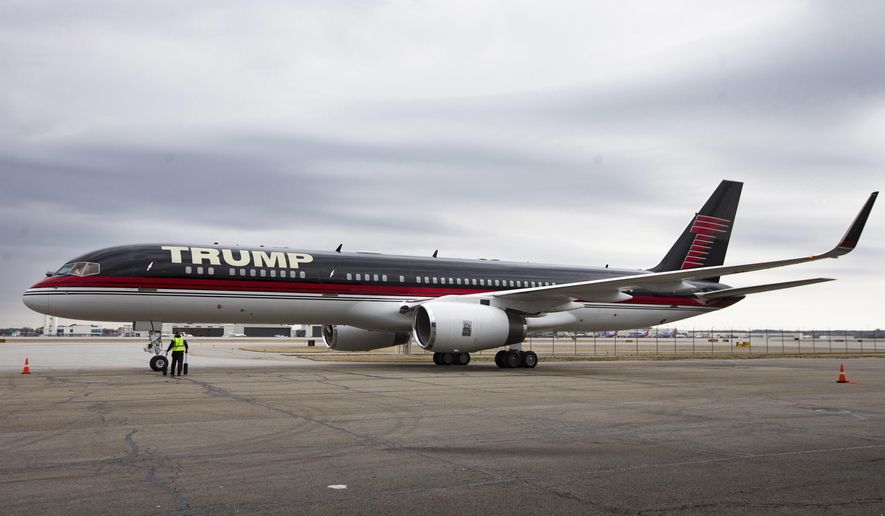 FILE - In this March 1, 2016 file photo, Republican presidential candidate Donald Trump&#39;s private jet arrives at Port-Columbus International Airport, in Columbus, Ohio. President Donald Trump&#39;s private jet, an instantly recognizable Boeing 757 used during his campaign, was caught up in a quintessential New York City traffic mishap at LaGuardia Airport on Wednesday, Nov. 28, 2018: a fender bender while someone else was trying to park. A corporate jet maneuvering into a parking spot clipped the wing of Trump&#39;s parked plane around 8:30 a.m., Trump&#39;s company, The Trump Organization, confirmed. (AP Photo/John Minchillo, File)