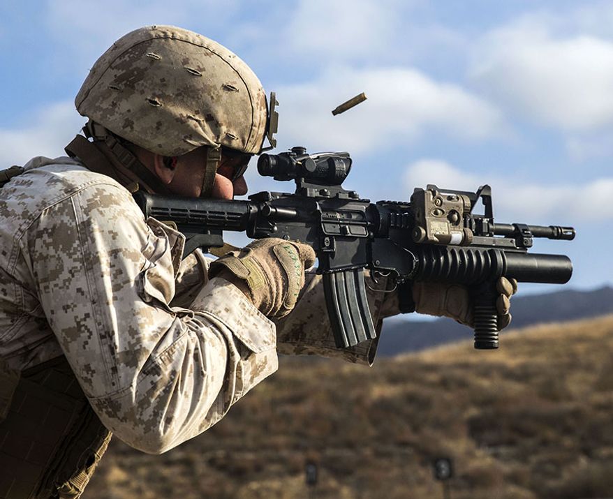 Lance Cpl. Mark Uriarte, a rifleman with 1st Battalion, 7th Marine Regiment, fires various drills on a live-fire range during a squad competition on Camp Pendleton, Calif., July 13, 2016. The 1st Marine Division hosted their annual Infantry Squad or “Super Squad” competition which pits the 1st, 5th, and 7th Marine Regiments and a Light Armored Reconnaissance Battalion against each other in tests designed to evaluate their leadership and small unit, infantry skills. (U.S. Marine Corps photo by Cpl. Jonathan Boynes)