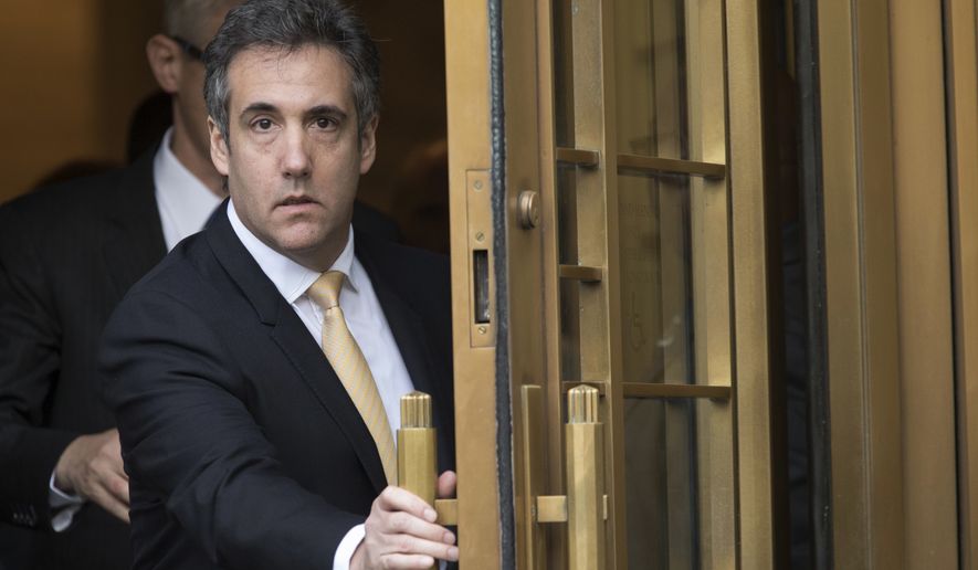 FILE - In this Aug. 21, 2018, file photo, Michael Cohen leaves Federal court, in New York. Cohen, President Trump's ex-lawyer, is making an court appearance before a federal judge in New York on Thursday, Nov. 29. (AP Photo/Mary Altaffer, File)