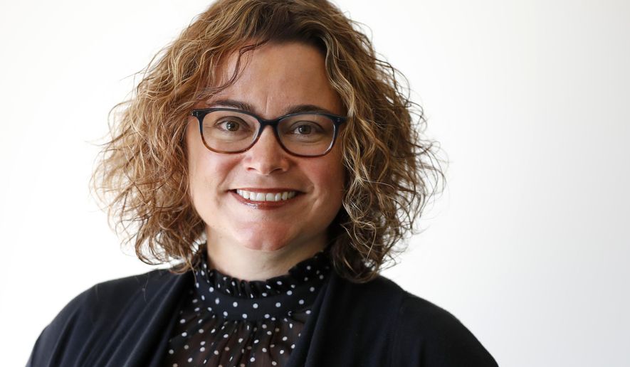 Anna Johnson, Associated Press news director for the western United States, poses for a portrait at the AP's office in Phoenix on Wednesday, Nov. 28, 2018. The global news cooperative announced Thursday, Nov. 29, that Johnson will become the news director for Europe and Africa, selecting a veteran leader of journalists with experience reporting from around the world to lead its coverage of two continents. Johnson will start her new role on in December. (AP Photo/Matt York)
