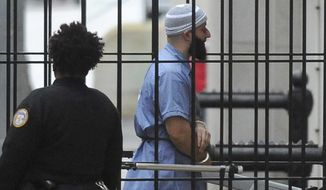 FILE - In this Feb. 3, 2016 file photo, Adnan Syed enters Courthouse East prior to a hearing in Baltimore. Maryland&#39;s highest court is set to hear arguments in the high-profile case of Syed whose murder conviction was chronicled in the hit &amp;quot;Serial&amp;quot; podcast. Two years after a new trial was ordered for Syed, the Maryland Court of Special Appeals on Thursday, Nov. 29, 2018, will hear oral arguments in the case. He was convicted in 2000 of strangling his ex-girlfriend and burying her body in a Baltimore park. Syed is serving a life sentence. (Barbara Haddock Taylor/The Baltimore Sun via AP, File)