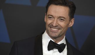 FILE - In this Nov. 18, 2018 file photo, Hugh Jackman arrives at the Governors Awards at the Dolby Theatre in Los Angeles. Jackman will launch his first ever world tour next year, performing at arenas mostly reserved for pop, rock and rap stars. Jackman announced his “The Man. The Music. The Show.” tour on Thursday, Nov. 29,  which will feature Jackman singing songs from “The Greatest Showman,” “Les Miserables” and Broadway musicals, among other selections.   (Photo by Jordan Strauss/Invision/AP, File)