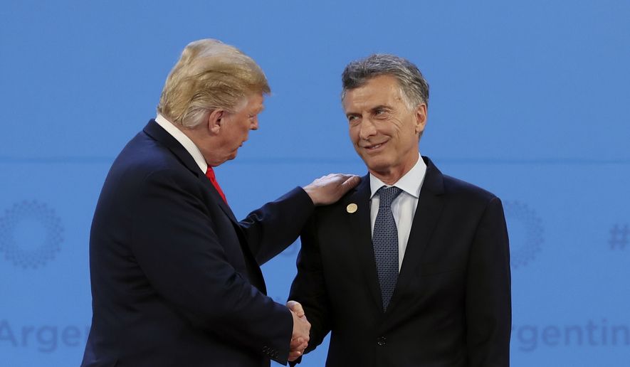 Argentine President Mauricio Macri has a good personal relationship with President Trump. His economy, which he promised to jump-start, struggles in part because a Trump tax-cut-fueled boom in the U.S. and a rising dollar have sucked up investment money that once went to Argentina and other hot emerging markets. (Associated Press/File)