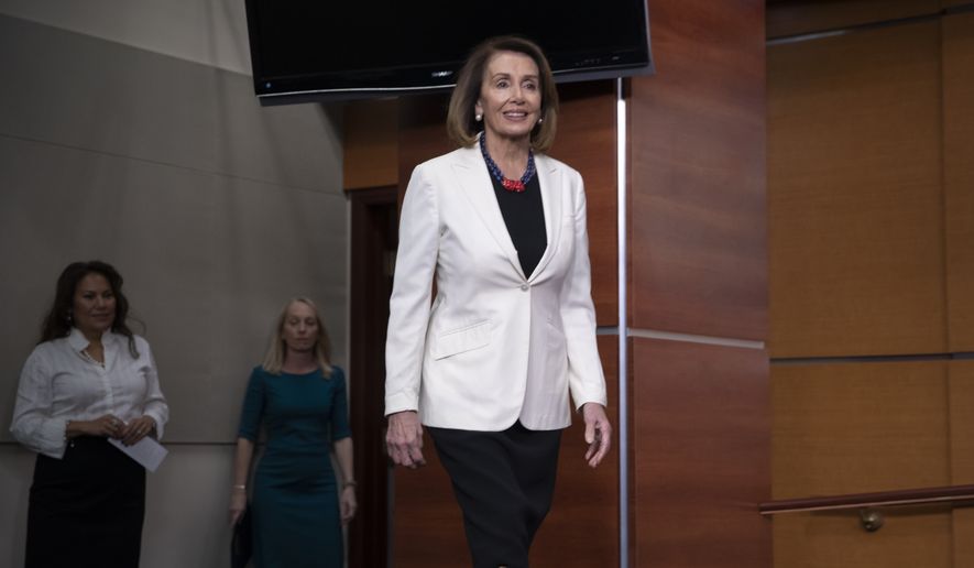 House Minority Leader Nancy Pelosi, D-Calif., arrives at a news conference to discuss her priorities when Democrats assume the majority in the 116th Congress in January, at the Capitol in Washington, Friday, Nov. 30, 2018. (AP Photo/J. Scott Applewhite)