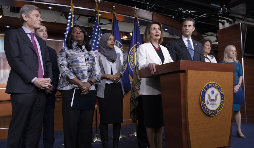 In this file photo, House Minority Leader Nancy Pelosi, D-Calif., is joined by fellow Democrats at a news conference to discuss their priorities when they assume the majority in the 116th Congress in January, at the Capitol in Washington, Friday, Nov. 30, 2018. From left are, Rep.-elect Tom Malinowski, D-N.J., Rep.-elect Chris Pappas, D-N.H., Rep. Terri Sewell, D-Ala., Rep.-elect Ilhan Omar, D-Minn., Rep. John Sarbanes, D-Md., Rep.-elect Veronica Escobar, D-Texas, and Rep.-elect Mary Gay Scanlon, D-Pa. (AP Photo/J. Scott Applewhite)