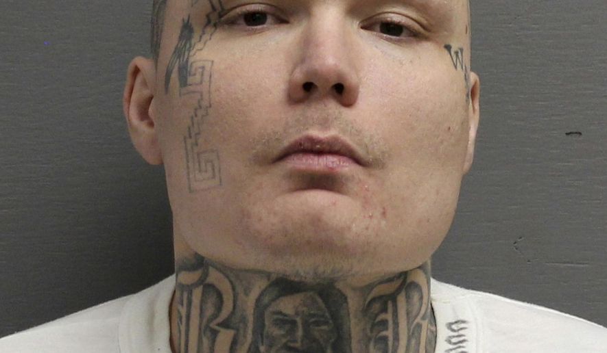 This undated photo provided by the Cascade County Sheriff's Office shows James Michael Parker, from Montana, who is charged with killing another man by hitting him in the neck with a tomahawk during an early morning street fight sparked by an ongoing feud. Parker was arrested Thursday, Nov. 29, 2018, and charged Friday with deliberate homicide in the March 22, death of 45-year-old Lloyd Geaudry in Great Falls, Mont. (Cascade County Sheriff's Office via AP)