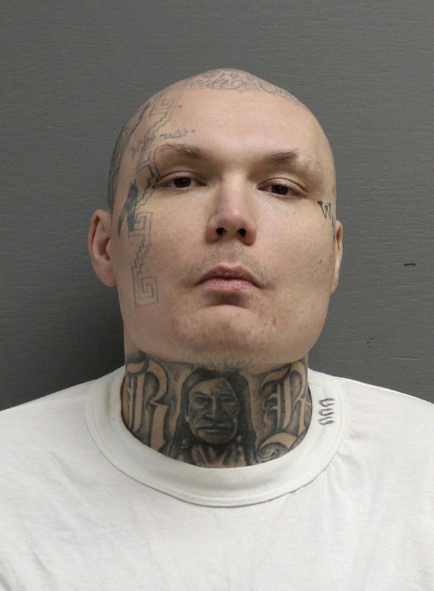 This undated photo provided by the Cascade County Sheriff's Office shows James Michael Parker, from Montana, who is charged with killing another man by hitting him in the neck with a tomahawk during an early morning street fight sparked by an ongoing feud. Parker was arrested Thursday, Nov. 29, 2018, and charged Friday with deliberate homicide in the March 22, death of 45-year-old Lloyd Geaudry in Great Falls, Mont. (Cascade County Sheriff's Office via AP)