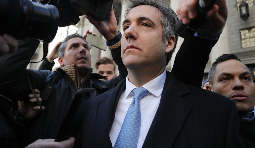 In this Nov. 29, 2018, photo, Michael Cohen walks out of federal court in New York. A pattern of deception by advisers to President Donald Trump, aimed at covering up Russia-related contacts during the 2016 campaign and transition, has unspooled bit by bit in criminal cases from special counsel Robert Mueller.  (AP Photo/Julie Jacobson)