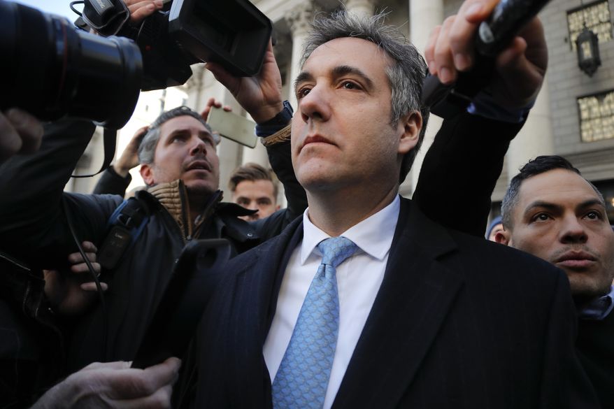 In this Nov. 29, 2018, photo, Michael Cohen walks out of federal court in New York. A pattern of deception by advisers to President Donald Trump, aimed at covering up Russia-related contacts during the 2016 campaign and transition, has unspooled bit by bit in criminal cases from special counsel Robert Mueller.  (AP Photo/Julie Jacobson)