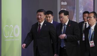 China&#39;s President Xi Jinping, left, enters for the start of the G20 summit in Buenos Aires, Argentina, Friday, Nov. 30, 2018. Heads of state from the world&#39;s leading economies were invited to the Group of 20 summit to discuss issues like development, infrastructure and investment, but those themes seem like afterthoughts, overshadowed by contentious matters from the U.S.-China trade dispute to the conflict over Ukraine. (AP Photo/Ricardo Mazalan)