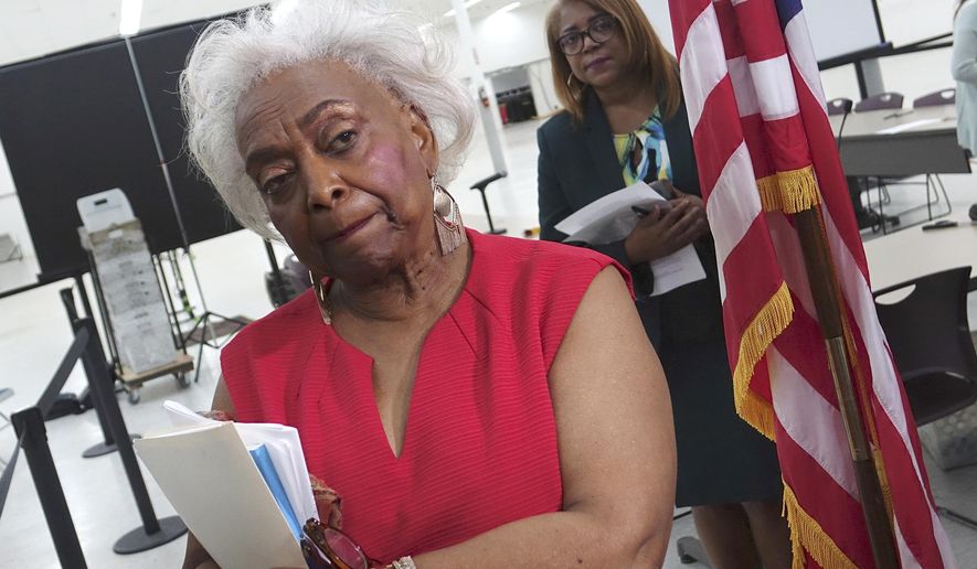 Broward County Supervisor of Elections Brenda Snipes listens to questions from the media, Sunday, Nov. 18, 2018, at the Broward Supervisor of Elections office in Lauderhill, Fla. Broward County reported their recount results with 52 minutes to spare Sunday. (Joe Cavaretta/South Florida Sun-Sentinel via AP)
