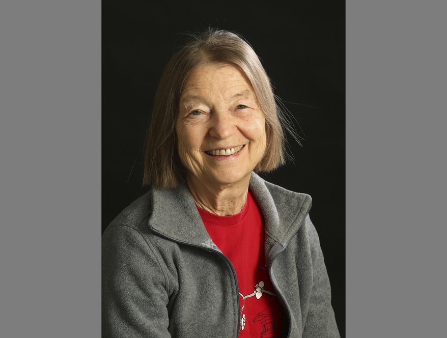 In this Wednesday, Nov. 21, 2018 photo, Suzanne Rich Osborn is shown in Fairbanks, Alaska. A former activist, school teacher and midwife, Osborn founded the Fairbanks Peace Choir in 2005 as a way to inspire people and promote understanding, social justice and environmental stewardship. (Eric Engman/Fairbanks Daily News-Miner via AP)