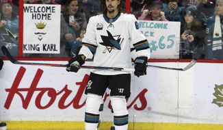 San Jose Sharks&#39; Erik Karlsson is seen during warm-up before first period NHL hockey action against the Ottawa Senators, in Ottawa on Saturday, Dec. 1, 2018. (Fred Chartrand/The Canadian Press via AP)