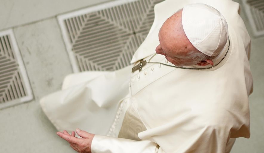 Pope Francis walks during an audience for members of the diocesis of Molfetta and Ugento-Santa Maria di Leuca, at the Vatican, Saturday, Dec. 1, 2018. (AP Photo/Andrew Medichini)