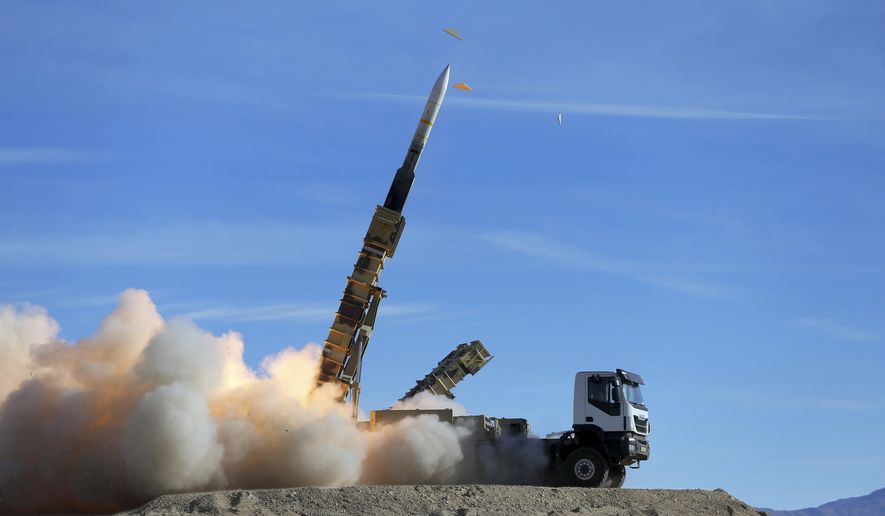 In this photo provided Monday, Nov. 5, 2018, by the Iranian Army, a Sayyad 2 missile is fired by the Talash air defense system during drills in an undisclosed location in Iran. Iran greeted the re-imposition of U.S. sanctions on Monday with air defense drills and a statement from President Hassan Rouhani that the nation faces a &quot;war situation,&quot; raising Mideast tensions as America&#39;s maximalist approach to the Islamic Republic takes hold. (Iranian Army via AP)