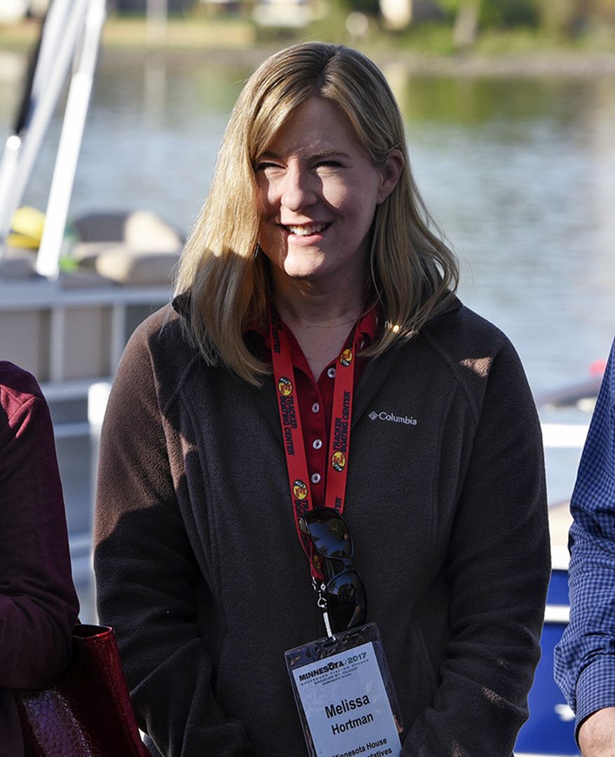 In this May 13, 2017 file photo, Minnesota state Rep. Melissa Hortman is seen at the start of the 2017 Governor's Fishing Opener in St. Cloud, Minn. Hortman, the incoming Democratic speaker, says one of the first things she'll do when she takes over is order the master mute button removed that has been used in the chamber to silence debate. The Republican leadership quietly had the button installed on the back of the rostrum during a renovation of the House chamber after the 2015 session came to a raucous end. (Dave Schwarz/The St. Cloud Times via AP, File)