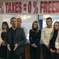 Kosovo Serb MP&#39;s stand in protest as they refuse to leave the Kosovo parliament building to protest against the 100 percent tax imposed on all goods imported from Serbia, in Pristina, Sunday Dec. 2, 2018.  The group said they would express their concern to European Union’s Enlargement Commissioner Johannes Hahn who is scheduled to visit Kosovo upcoming Monday. (AP Photo/Florent Bajrami)